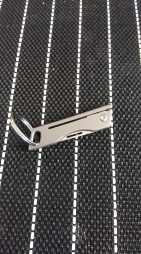 Titanium Alloy Mini Folding Knife High Hardness D2 Steel Sharp Knife With Keychain Pendant Disassembly Express Open Box EDC Tool photo review