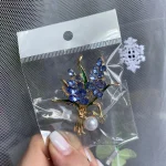 Beaut&Berry Ear of Wheat Brooches for Women Rhinestone Blue and Yellow Plant Pins 5-Color Unisex Casual Accessories Gifts photo review