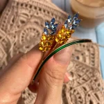 Beaut&Berry Trendy Ear of Wheat Brooches for Women Rhinestone Blue and Yellow Plant Pins 5-Color Unisex Casual Accessories Gifts photo review