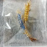 Beaut&Berry Ear of Wheat Brooches for Women Rhinestone Blue and Yellow Plant Pins 5-Color Unisex Casual Accessories Gifts photo review